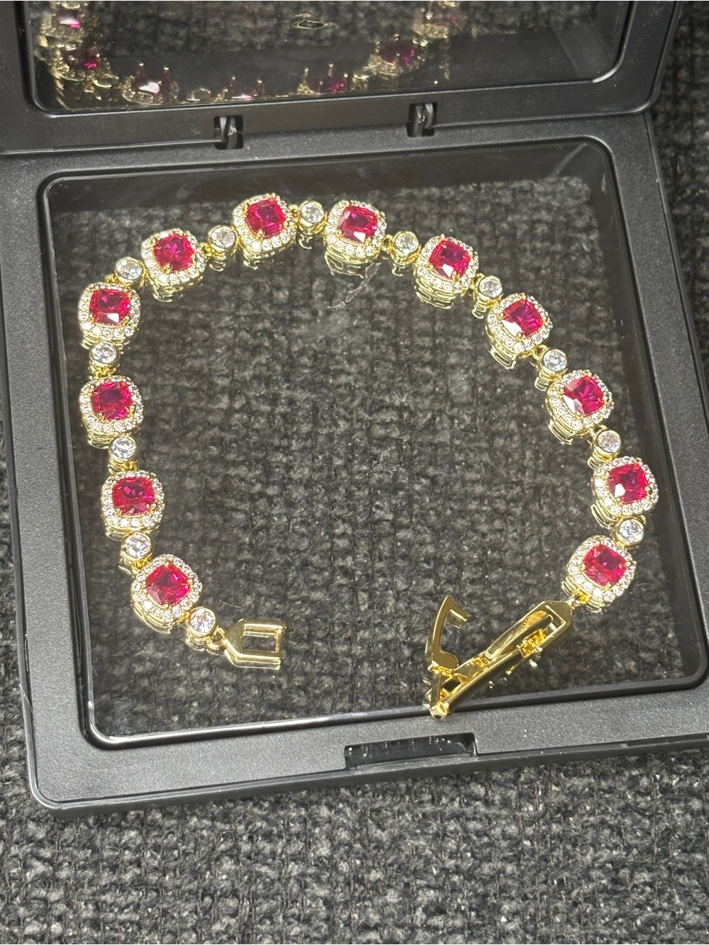 Gold Bracelet with Red Gemstone Accents